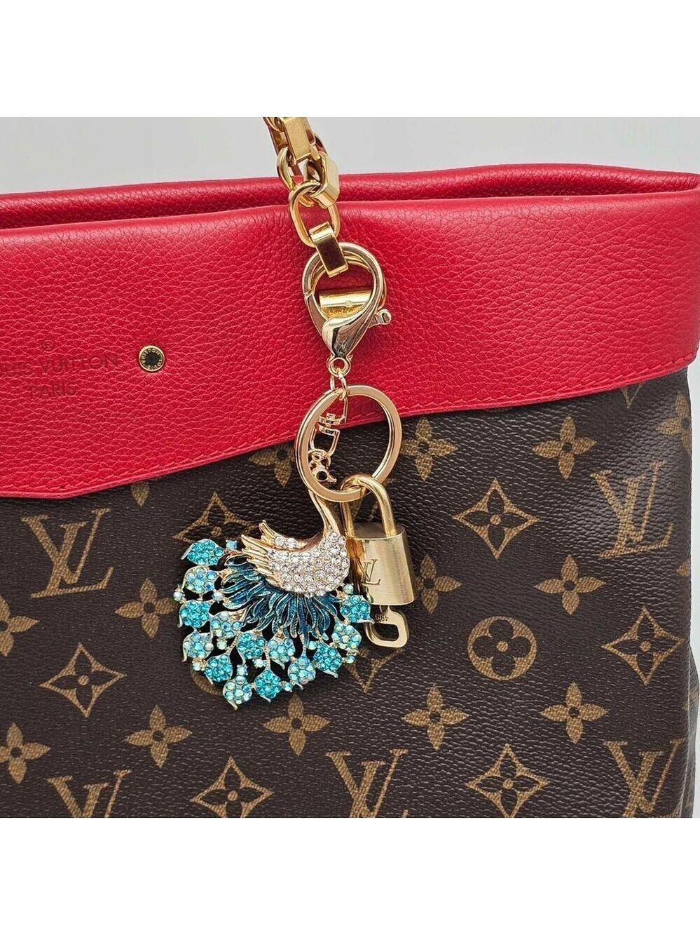 Authentic Louis Vuitton Lock & Key with unbranded Peacock Bagcharm, Keycharm